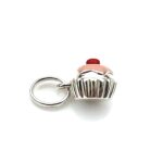 Whimsical Links of London Pink Cupcake Charm, highlighting the charm’s cherry-topped icing.