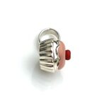 Detailed image of the Links of London Pink Cupcake Charm with silver base and enamel decorations.