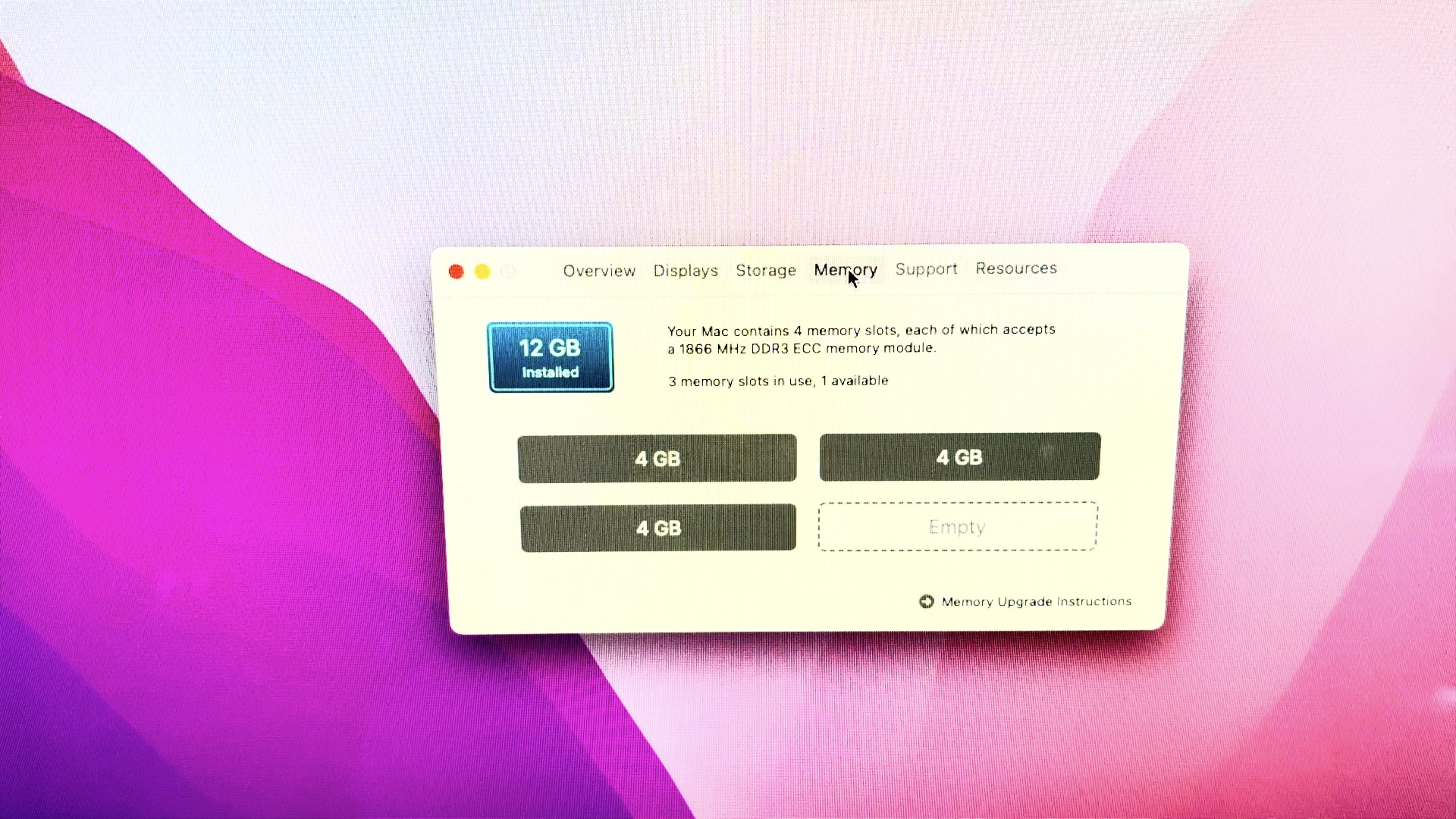 The Mac Pro 2013’s internal components during the RAM upgrade process.