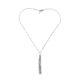 Detailed view of tassel pendant from the vintage Raindance necklace.
