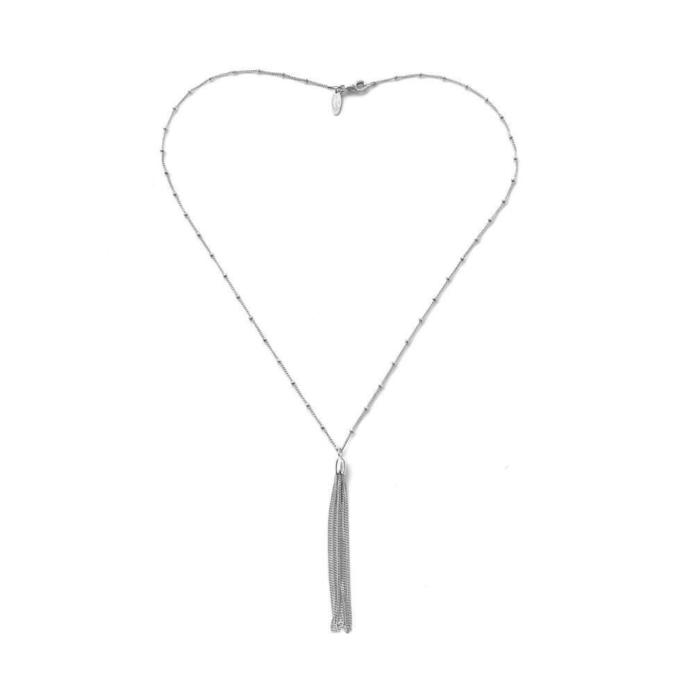 Detailed view of tassel pendant from the vintage Raindance necklace.