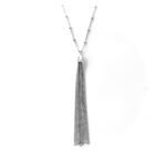 Close-up of vintage Links of London Raindance necklace with beaded chain and tassel pendant.