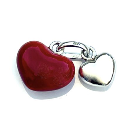 Close-up of the vintage 2009 Links of London Silver and Red Enamel Two Hearts Charm.