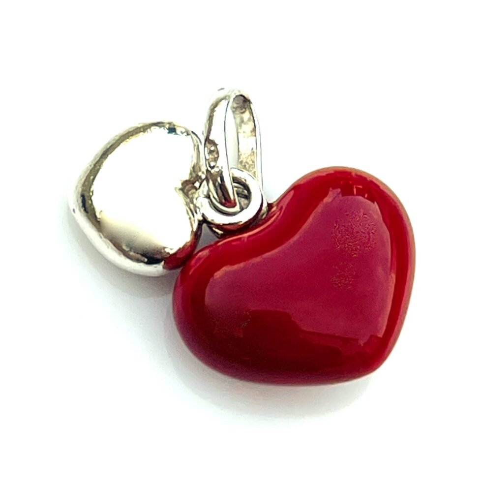 Links of London Silver and Red Enamel Two Hearts Charm displayed on a white surface.
