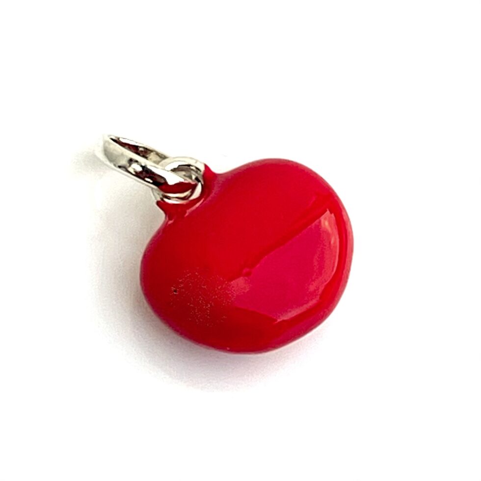 Side view showing the 3D red enamel heart charm details