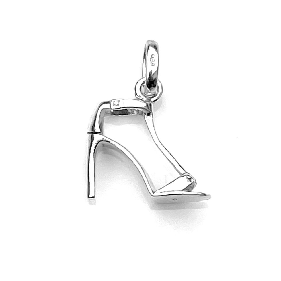Detailed shot of Links of London logo on the sole of the high heel shoe charm