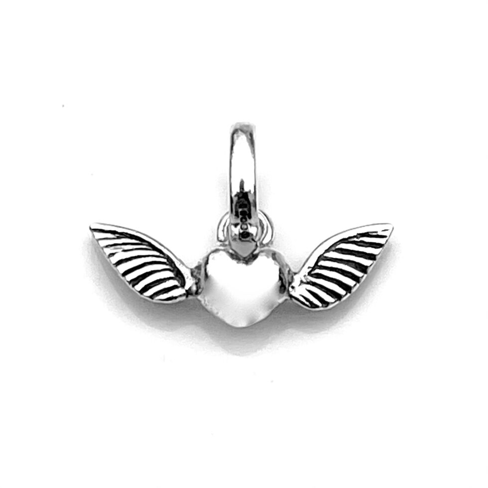 Detailed close-up of the heart with wings on the Links of London charm