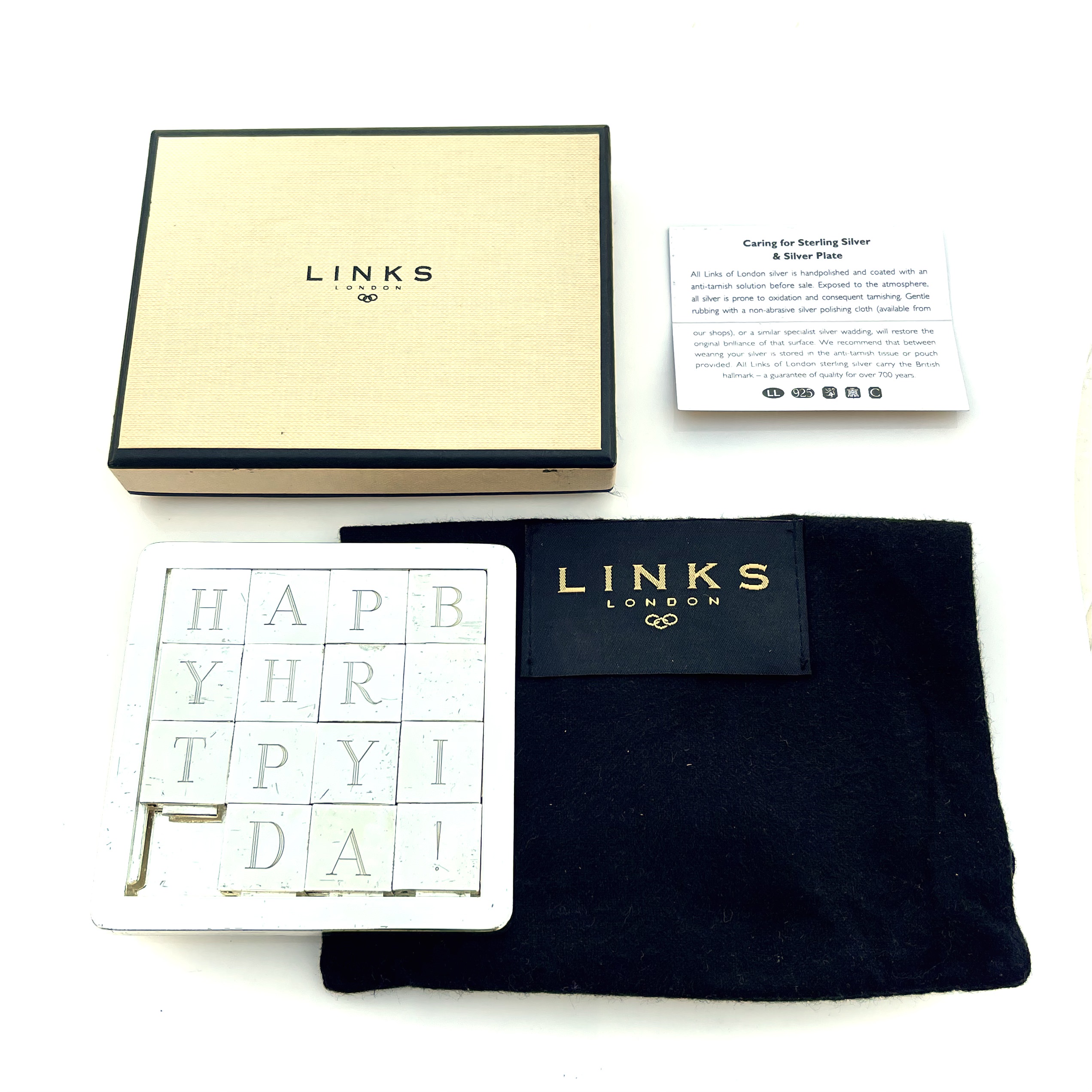 Professionally cleaned Links of London puzzle in vintage condition.