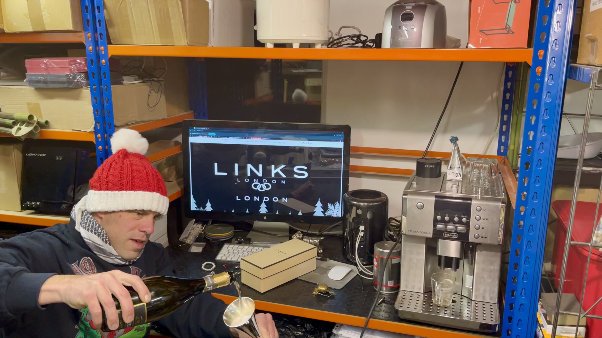 Celebratory moment with champagne flutes in the Links London workshop.
