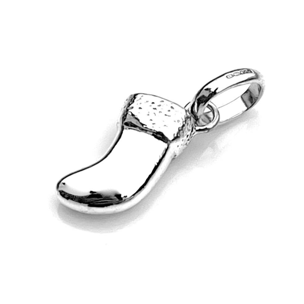 Back view of the Christmas Stocking charm, showing polished finish