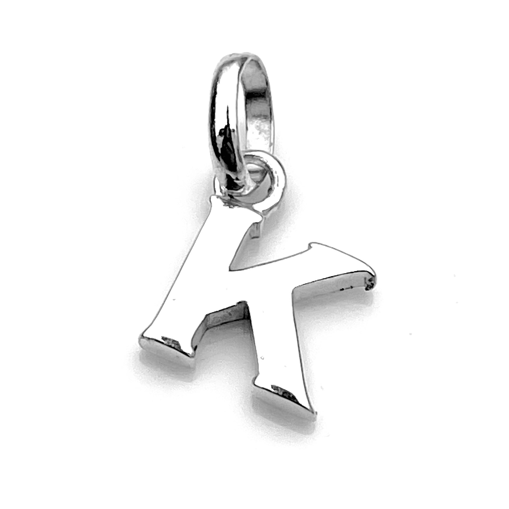 Side view highlighting the 2mm thickness of the 'K' Charm