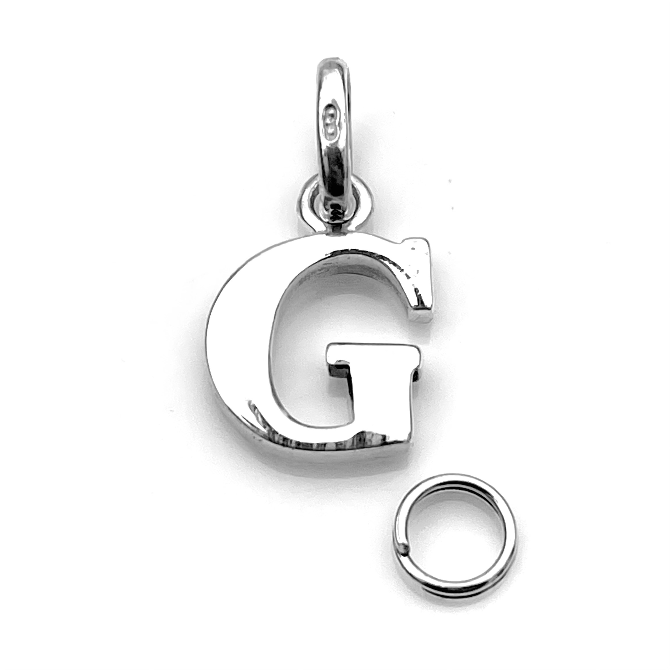 Side view highlighting the 3mm thickness of the 'G' Charm