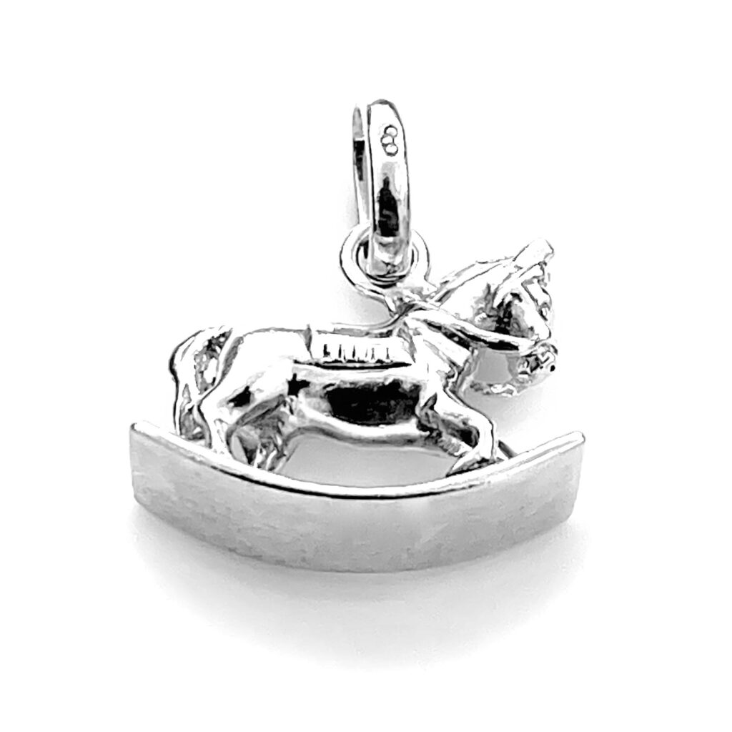 Close-up of intricate details on the Rocking Horse charm