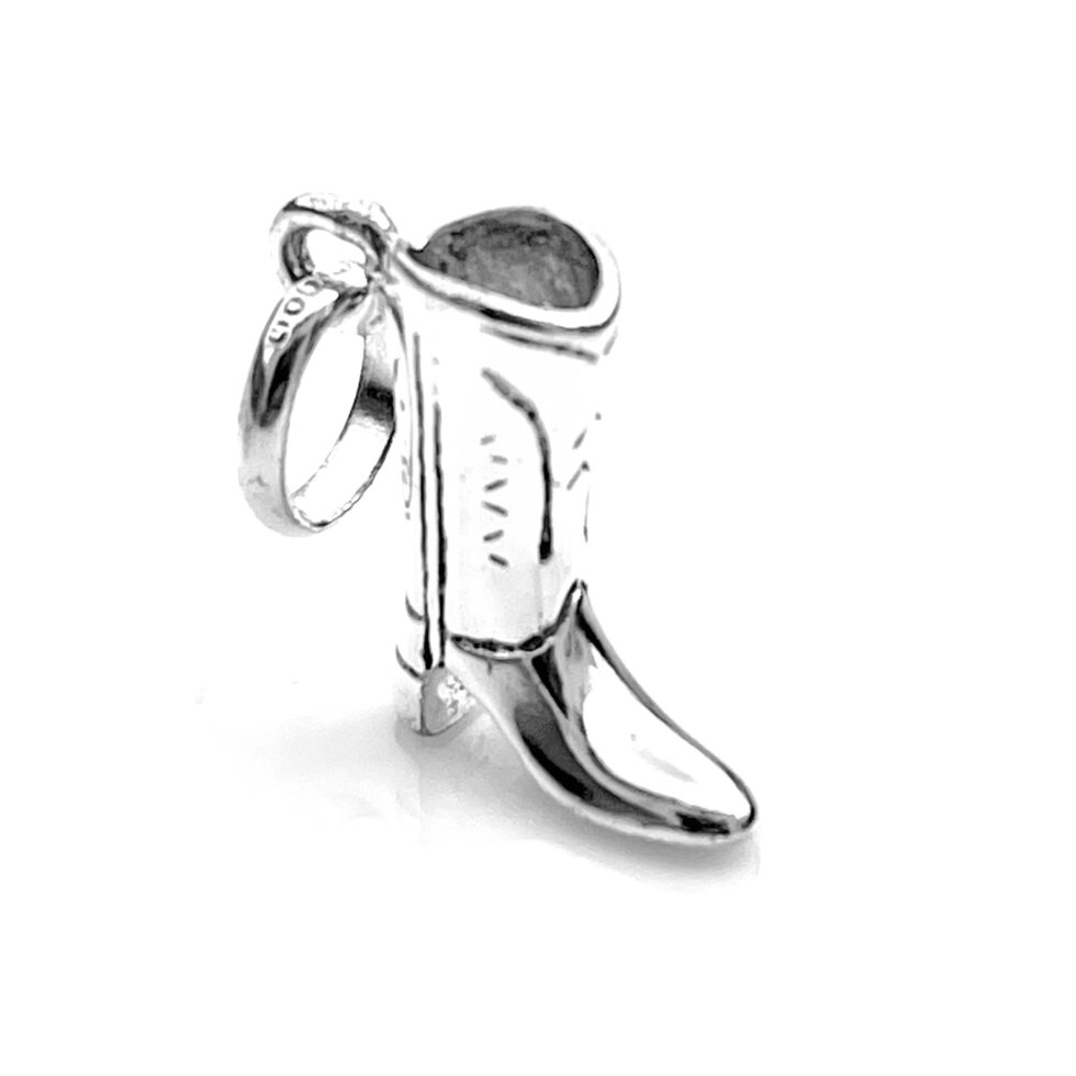 Side view showcasing the detailed cowboy boot design on the charm