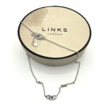 Vintage necklace with adjustable chain shown with original box