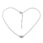 High-resolution image of the sterling silver three-ring feature on necklace