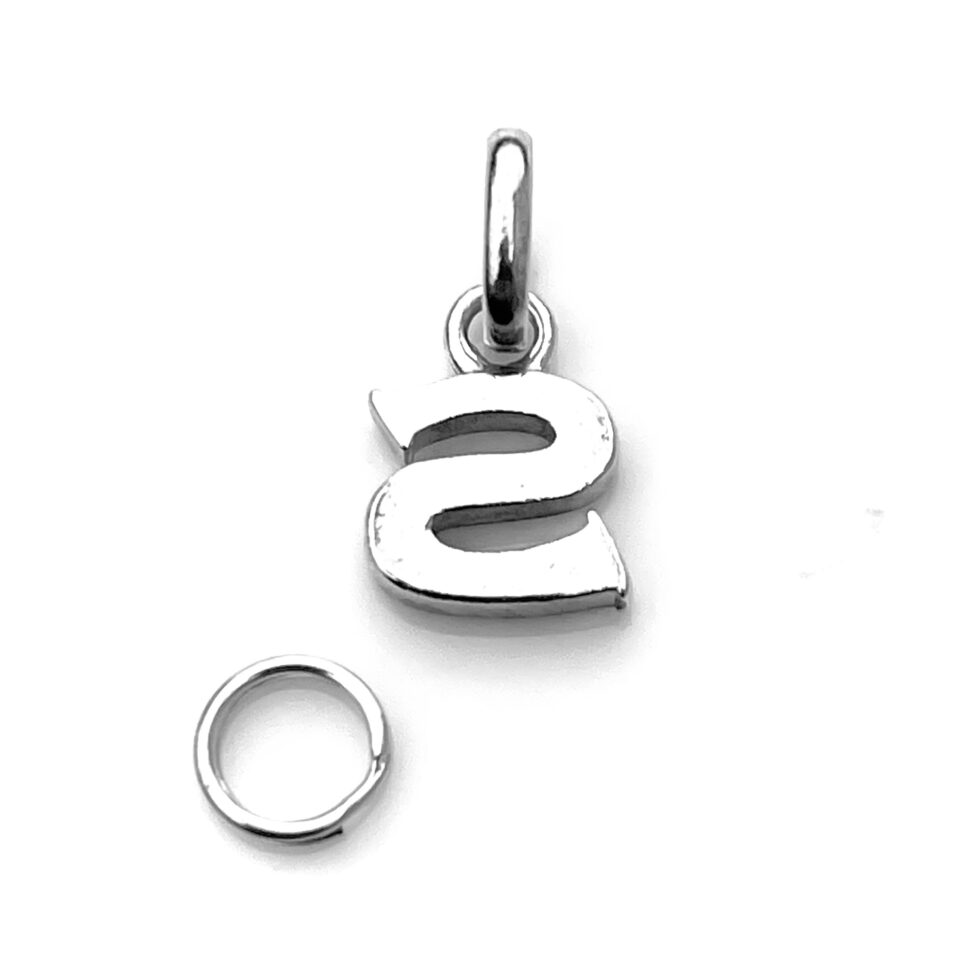 Close-up of the oval bail and split ring on the letter S charm.