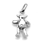 Teddy bear charm photographed under natural light, highlighting its details.