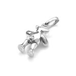 Close-up of the teddy bear’s polished sterling silver finish.