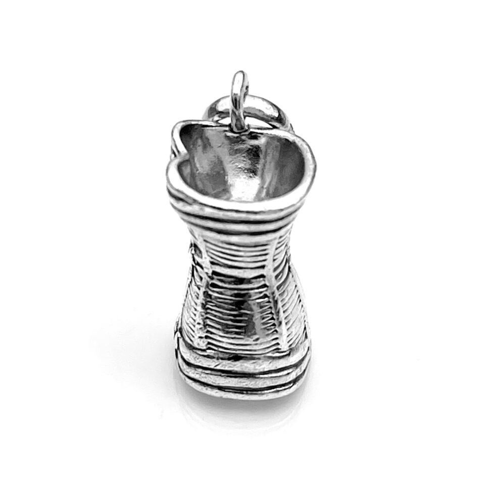 Side view showing the laced detailing of the Corset Charm