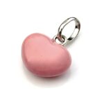 A close-up of the enamel finish with visible marks and pits due to age.