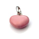 A collector’s showcase featuring the soft pink heart charm from 2008.