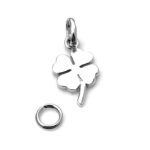 The clover charm photographed in natural light, highlighting its elegant design.