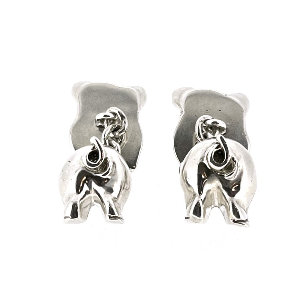 backs of the 1994 Links of London Pig Cufflinks showing the polished front and back pig sections.
