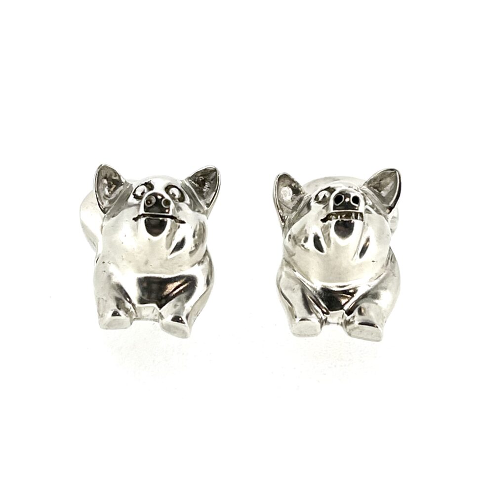 Close-up of the 1994 Links of London Pig Cufflinks showing the polished front sections.