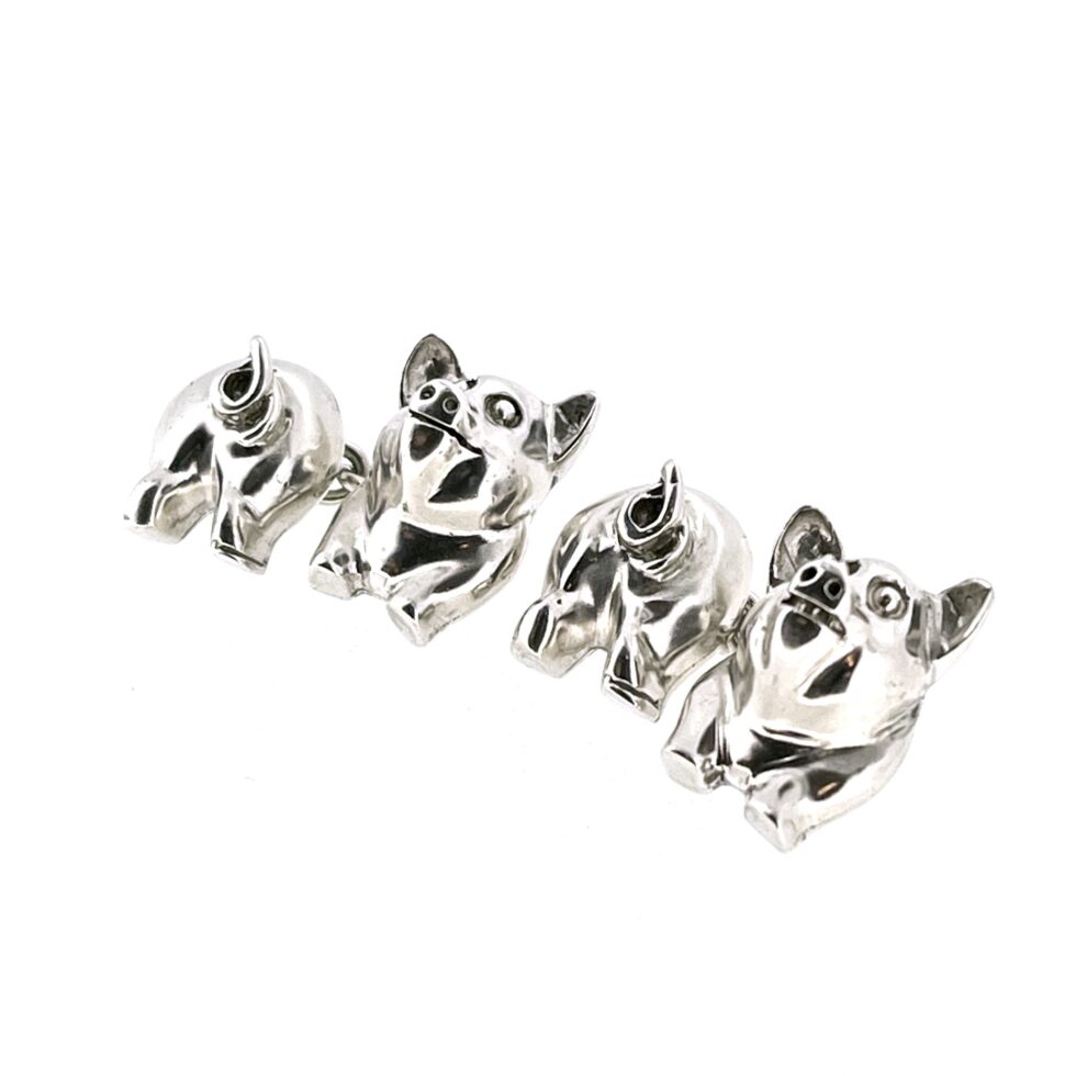 sides of 1994 Links of London Pig Cufflinks showing the polished front and back pig sections.
