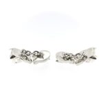 chains of the 1994 Links of London Pig Cufflinks showing the polished front and back pig sections.