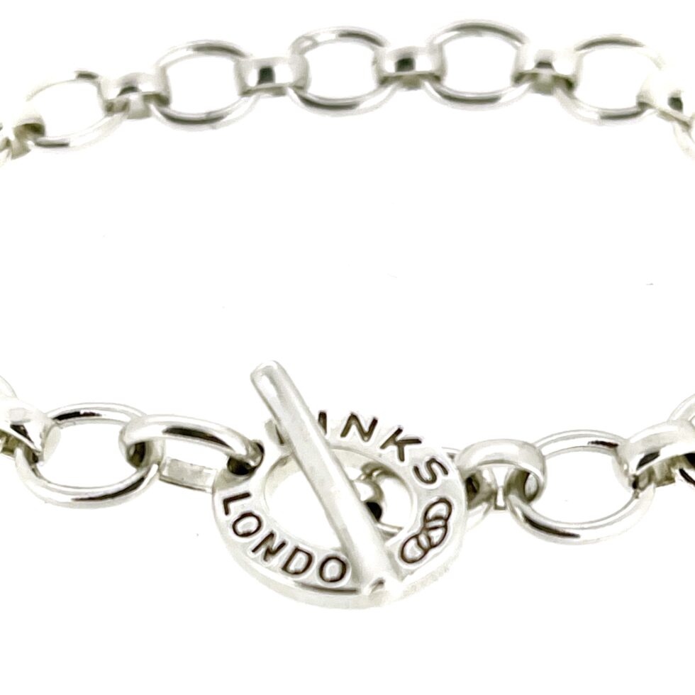 Close-up showing the size comparison of large and small links.