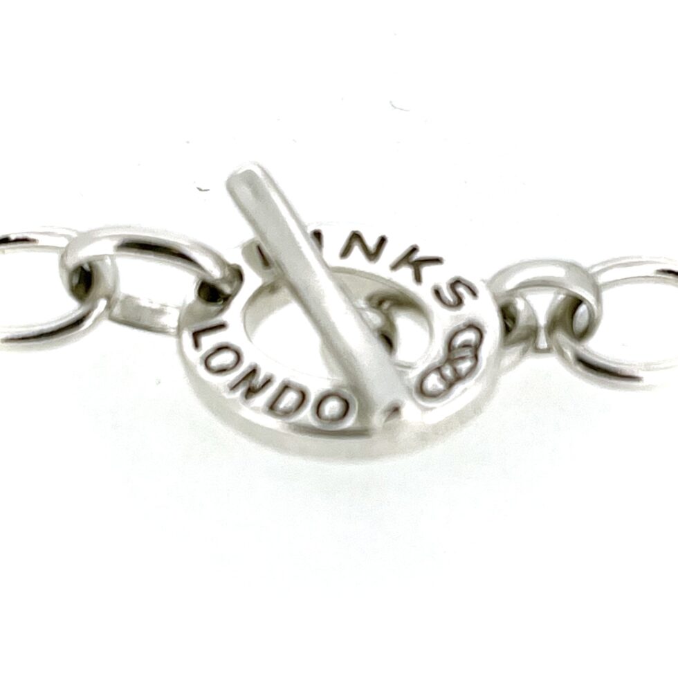 Overhead view showing the bracelet fastened into a circular shape.