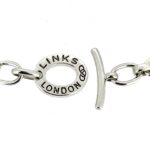 Close-up of the "LINKS LONDON" engraving on the toggle clasp.