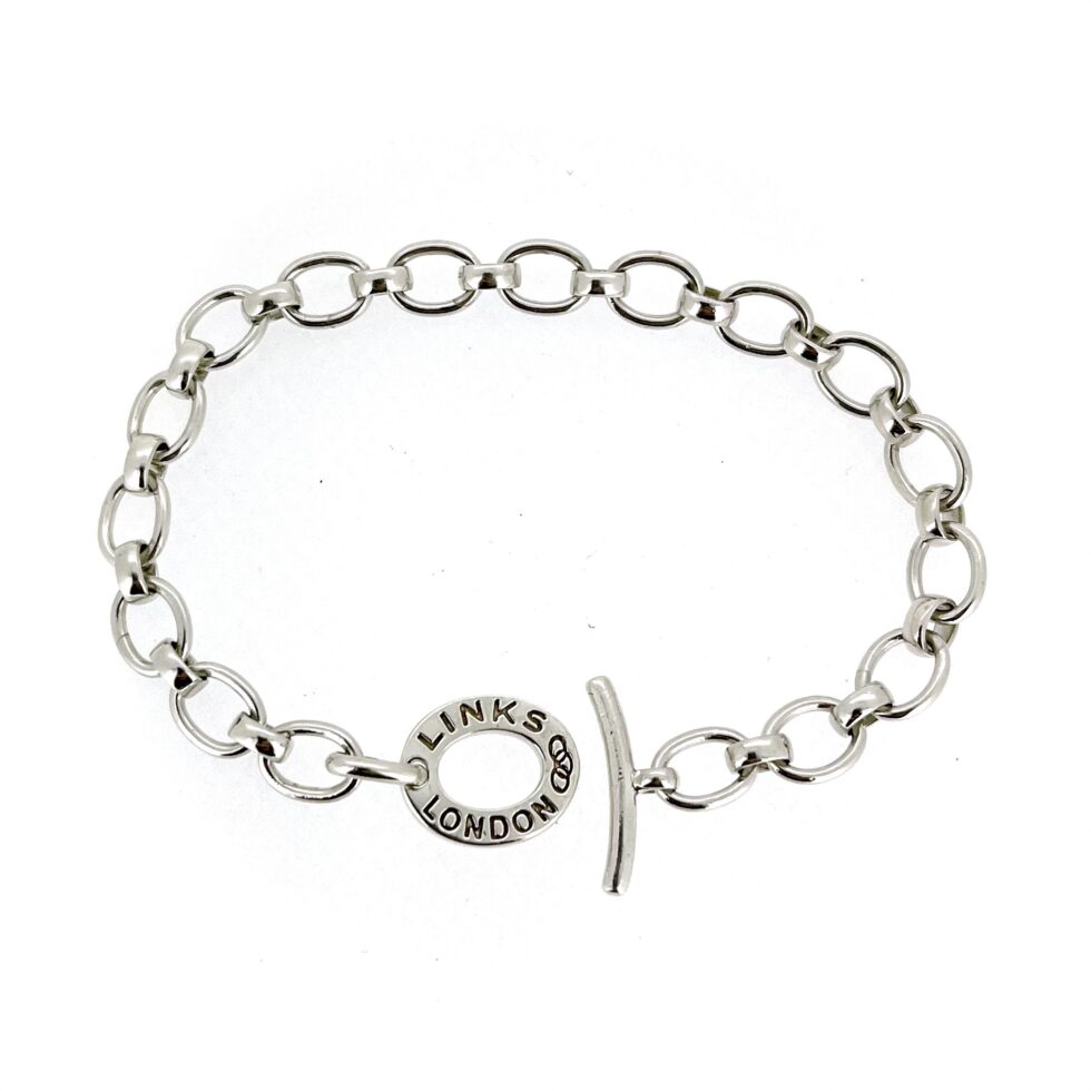 Artistic flat-lay of the bracelet on a white background.