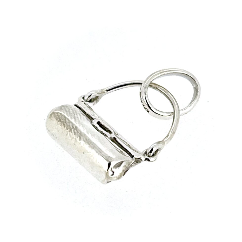 Front side view of vintage 2009 Links of London handbag charm.