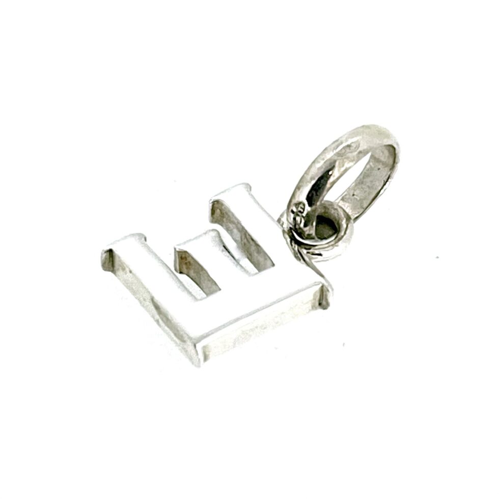 rear side view of the Vintage Links of London Letter E Charm in sterling silver.