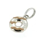 Close-up of the missing enamel detail with the engraved silver pattern beneath.