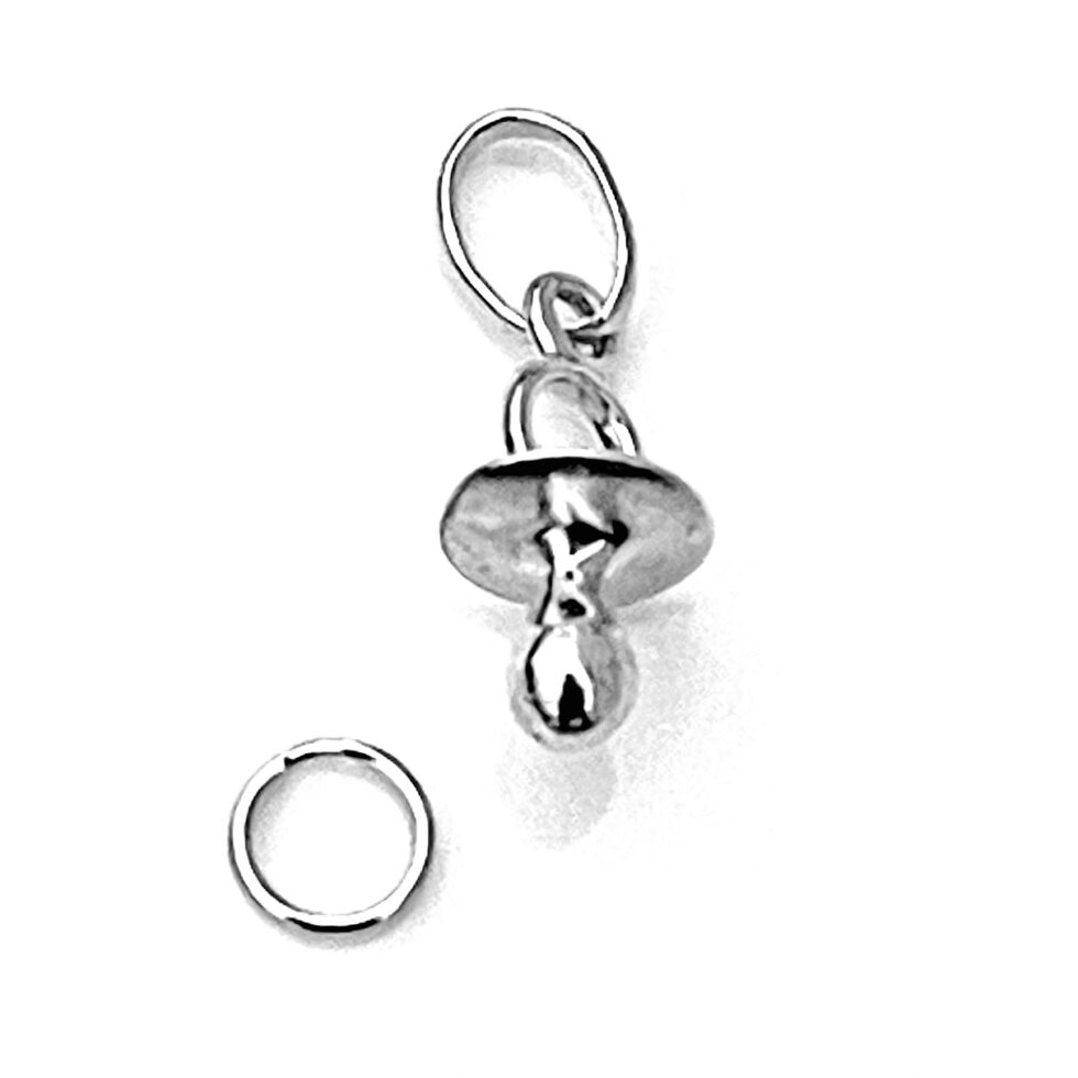 Minimalist shot of the charm on a white background.