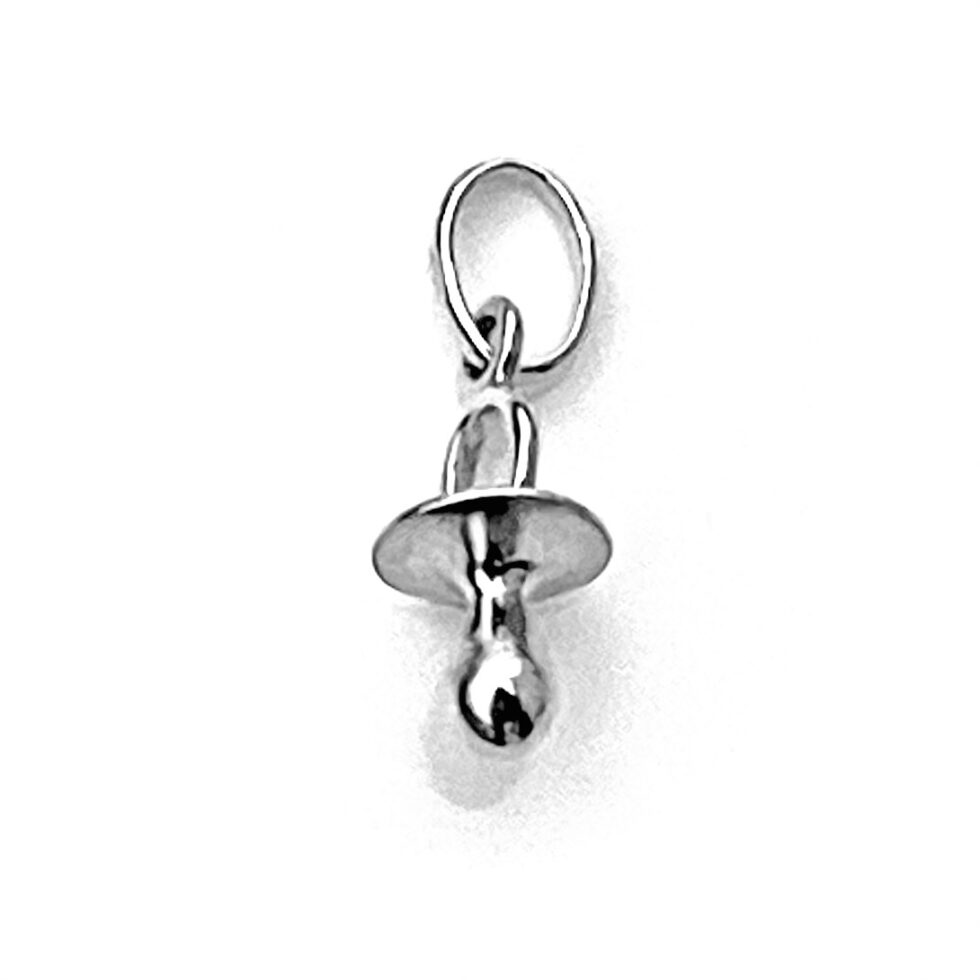 Overhead view of the baby’s dummy charm