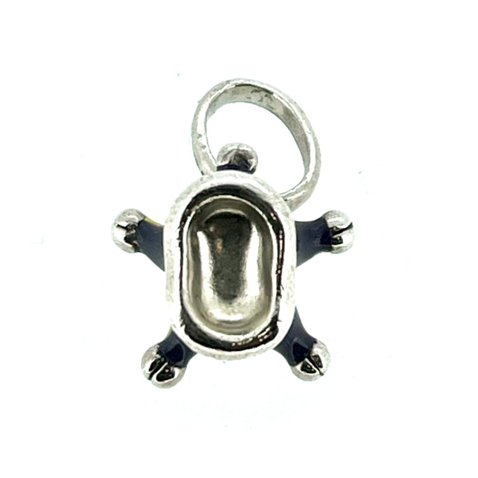 Base of the Links of London Jester's Hat Charm in sterling silver with purple and yellow enamel.