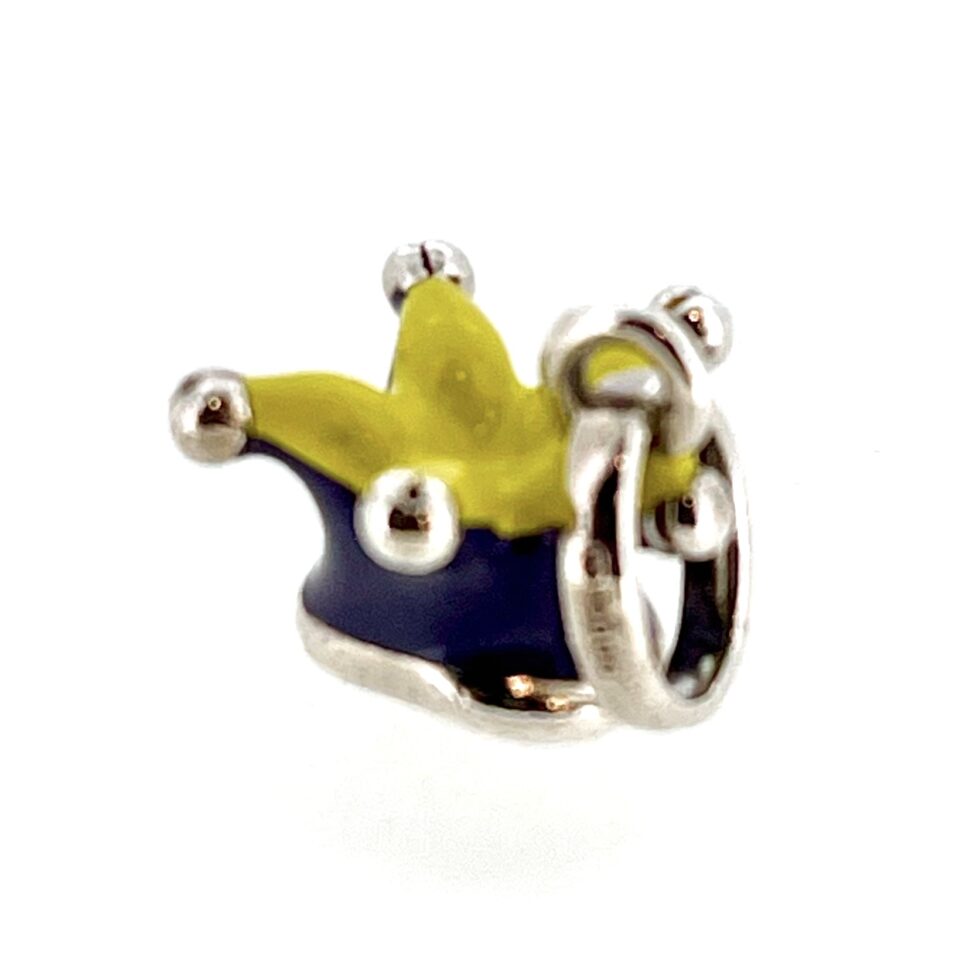 Side view showcasing the five decorative jingle bell-shaped tips.