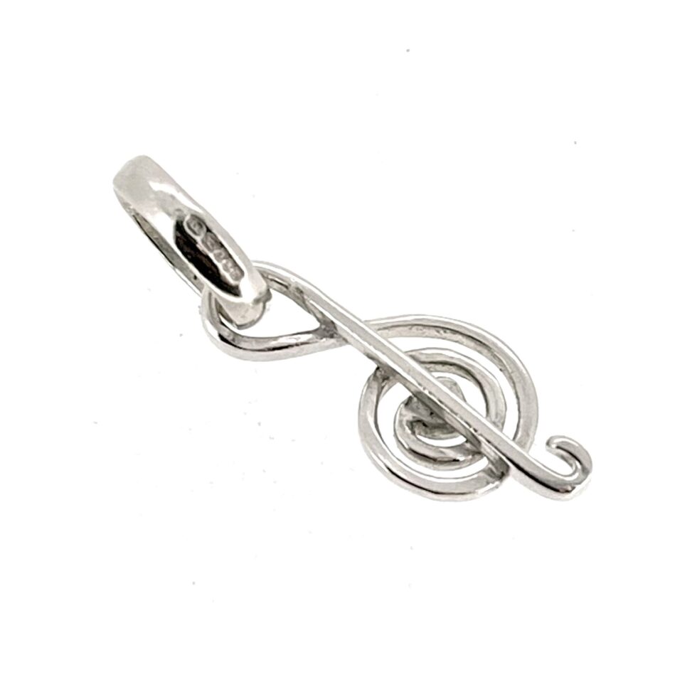 Close-up highlighting the dimensions of the charm.