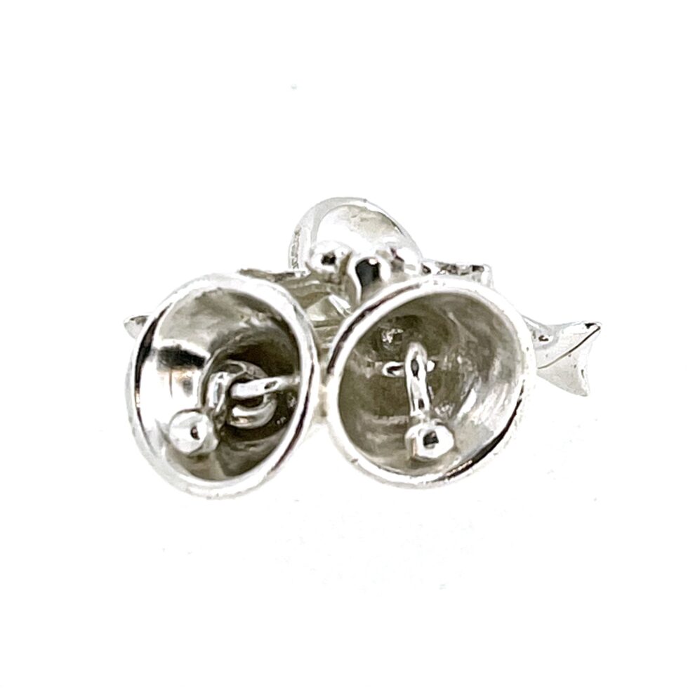 Angled view showing the bright finish of the Christmas Bells Charm.