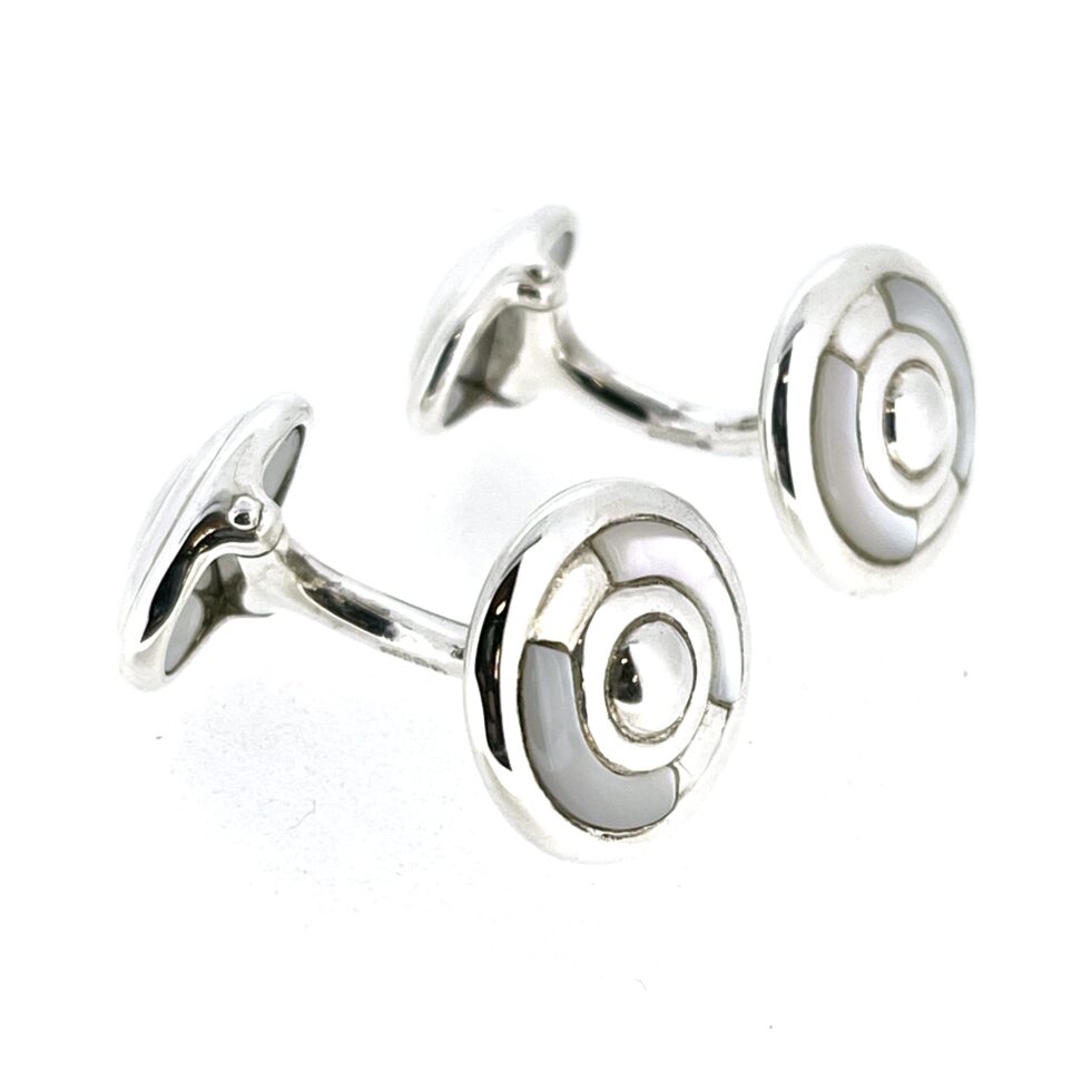 Side profile showcasing the solid curved bar and engraved swivel backs.
