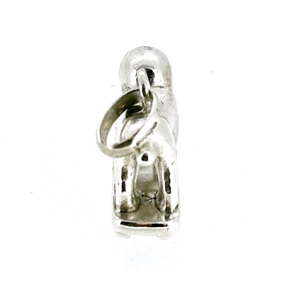tail end vintage Links of London Sterling Silver Bulldog on a Skateboard Charm.