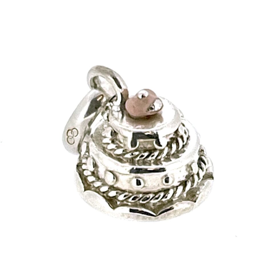 Artistic angle emphasising the charm’s three-dimensional design.