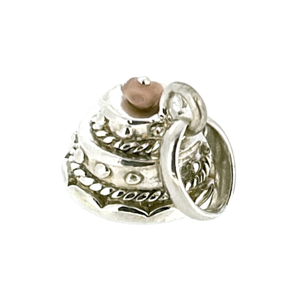 Vintage Links of London Wedding Cake Charm highlighting its polished silver finish.