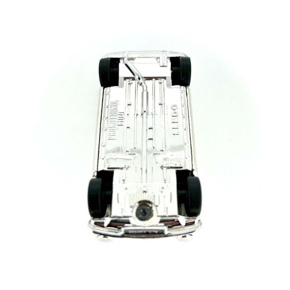 silver-plated Lledo Austin Mini Model with LINKS1 number plate.