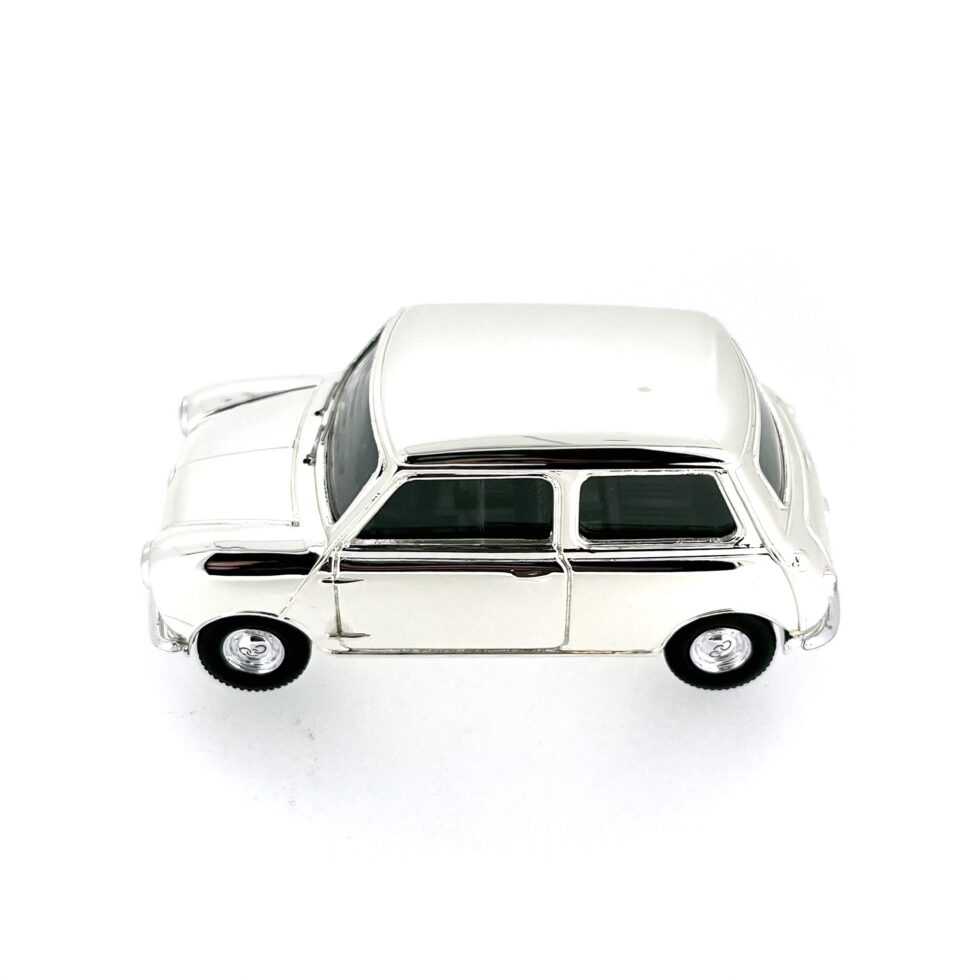 Side angle showcasing the polished silver-plated finish of the Lledo Austin Mini.